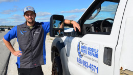 ASE-Certified Master Mechanic, Chase Weir, standing by mobile auto repair service truck in Navarre, FL ASE-Certified Master Mechanic, Chase Weir, standing by mobile auto repair service truck in Navarre, FL